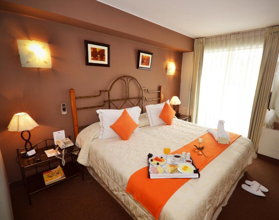 Suites Antique Apart Hotel Lima Quarto foto